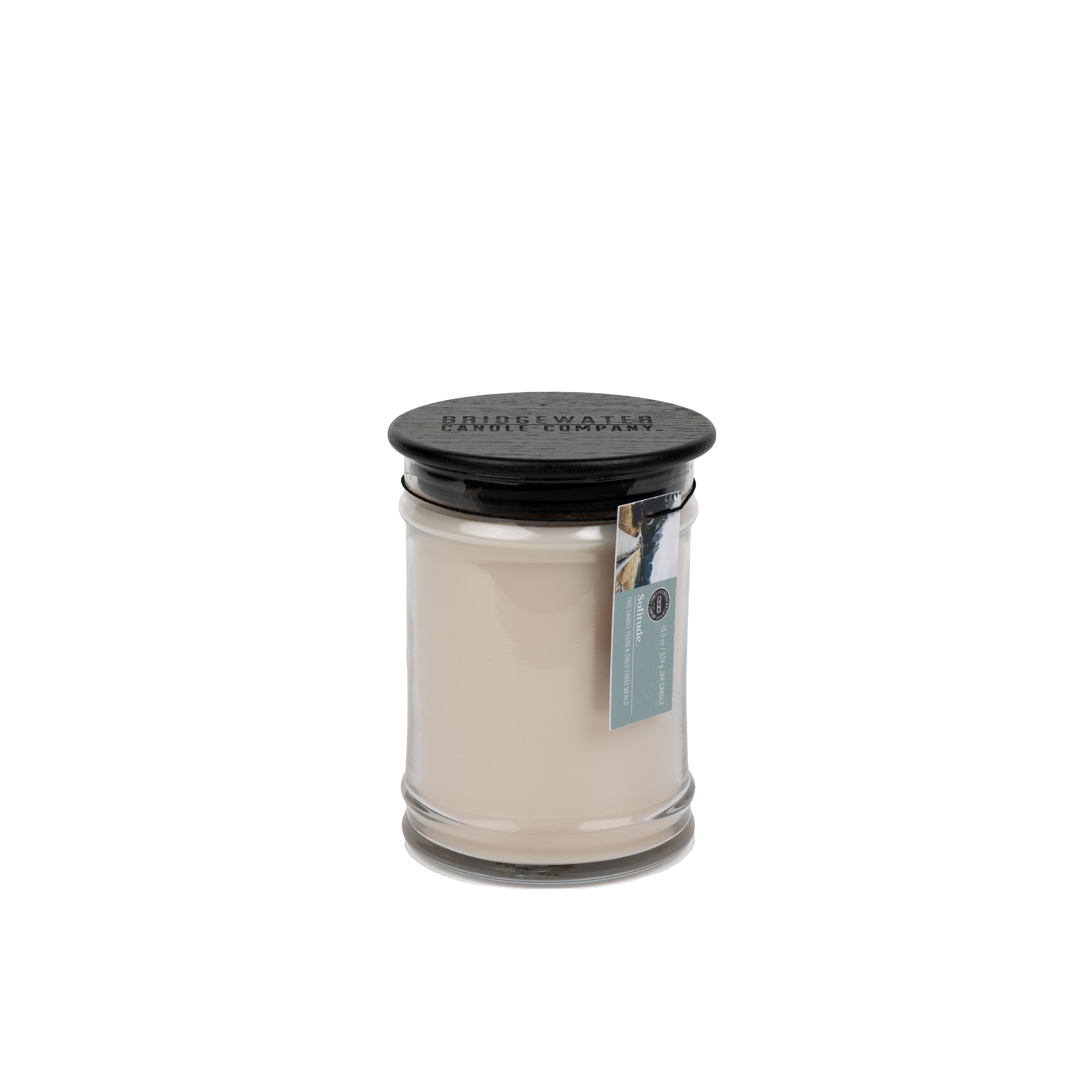 The Solitude Large Jar Candle by Bridgewater Candle features soy-blend wax in a clear glass jar with a black lid and blue tag, displayed against a plain white background.