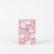 The Sweet Grace Modern Flower Sachet by Bridgewater Candle Company comes in a pink packet with floral and abstract patterns, offering the signature Sweet Grace scent to add a refreshing fragrance to any space.