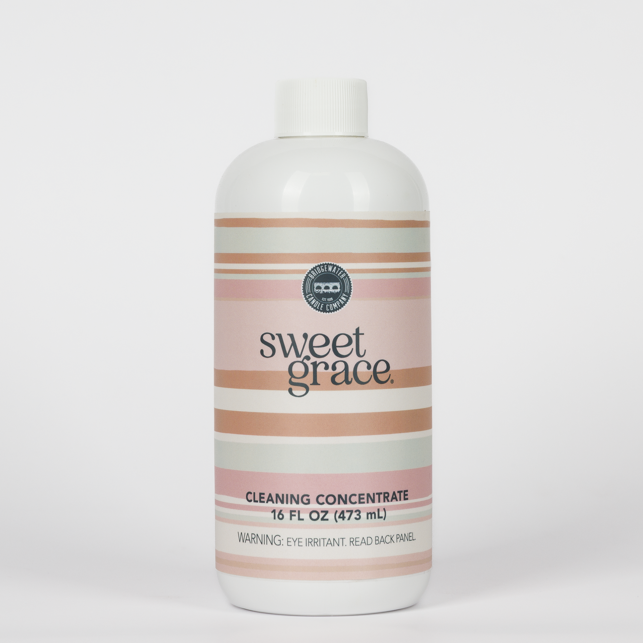 A 16 fl oz (473 mL) bottle of Bridgewater Candle's Sweet Grace Cleaning Concentrate | Mop Soap, featuring pink, cream, and gray stripes with a white cap, is displayed against a plain white background. This stylish and fragrant cleaner combines an appealing design with effective cleaning for your home.