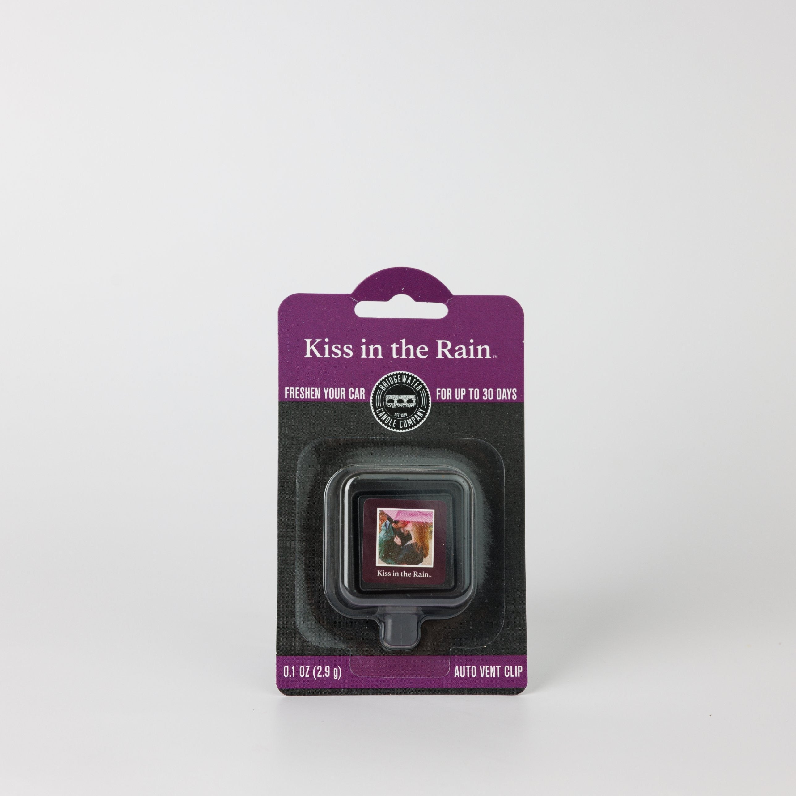 Bridgewater Candle Auto Vent Clip-Kiss in the Rain in purple packaging.