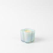 The Bridgewater Candle Sweet Grace Collection Candle #077 features a pastel iridescent, flower-shaped vessel filled with cream-colored soy-blend wax, set against a plain white background.