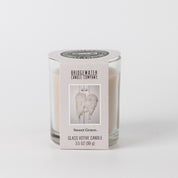 The Bridgewater Candle Sweet Grace Votive Candle (3.5 oz) features angel wings on its white glass and fills your space with the inviting Sweet Grace fragrance for a cozy ambiance.