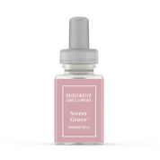 A Pura + Bridgewater Fragrance Refill - Sweet Grace by Bridgewater Candle Company with a pink label and gray cap stands on a white background, ideal for use in your favorite home fragrance diffuser.