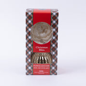 Bridgewater Candle Company's Christmas Bliss Holiday Mercury Flower Diffuser features a white flower atop plaid packaging with festive mercury finish accents, an 8 fl oz (236 mL) box, and a window to view the diffuser.