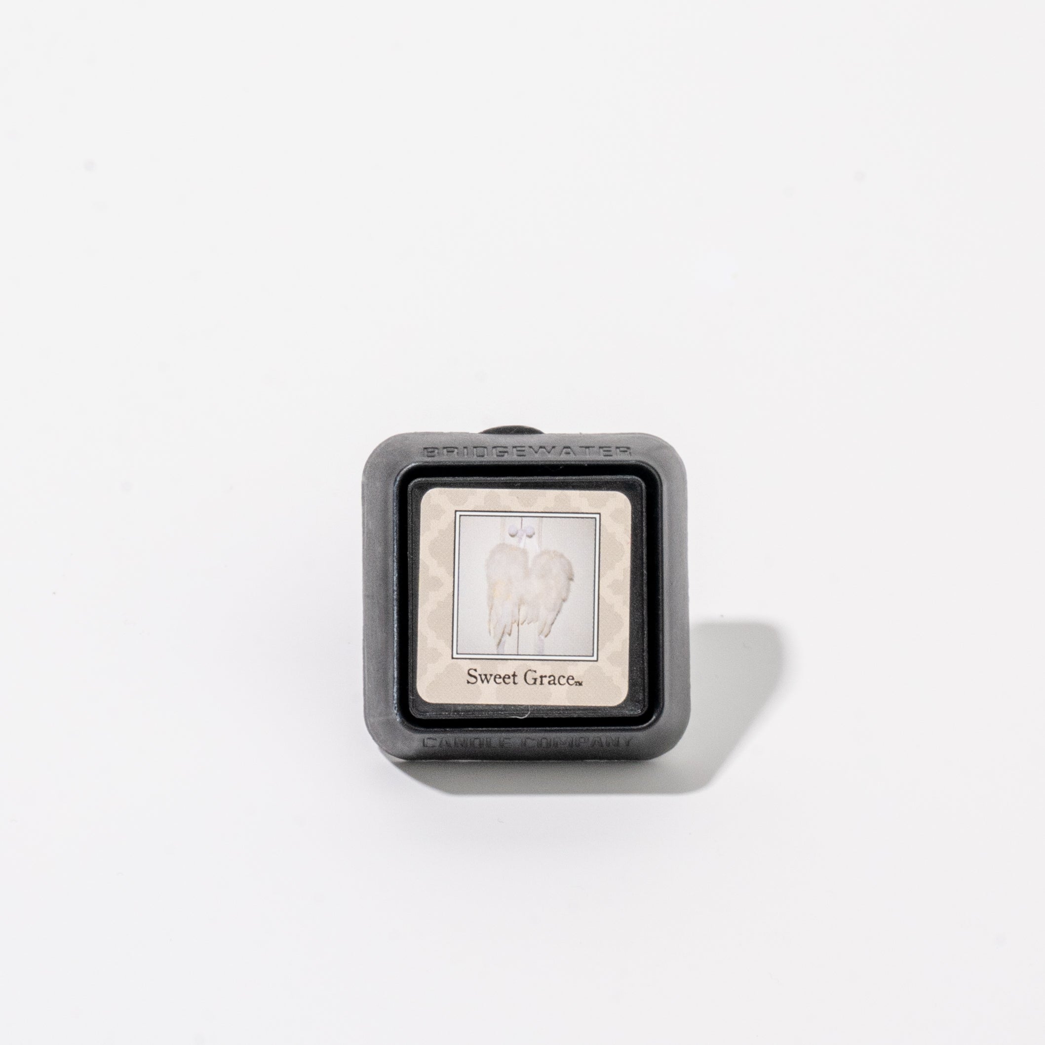Square Auto Vent Clip-Sweet Grace featuring a label with an illustration of white wings.