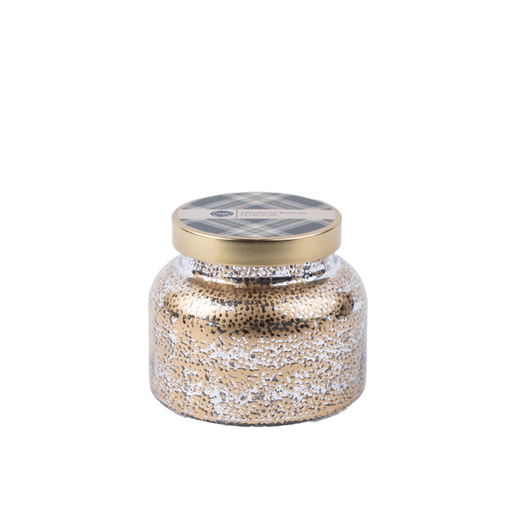 The Bridgewater Candle Company Afternoon Retreat Mercury Jar Candle features a gold lid and gold-silver speckled design, filled with soy-blend wax—ideal for home decor or storage, shown on a white background.