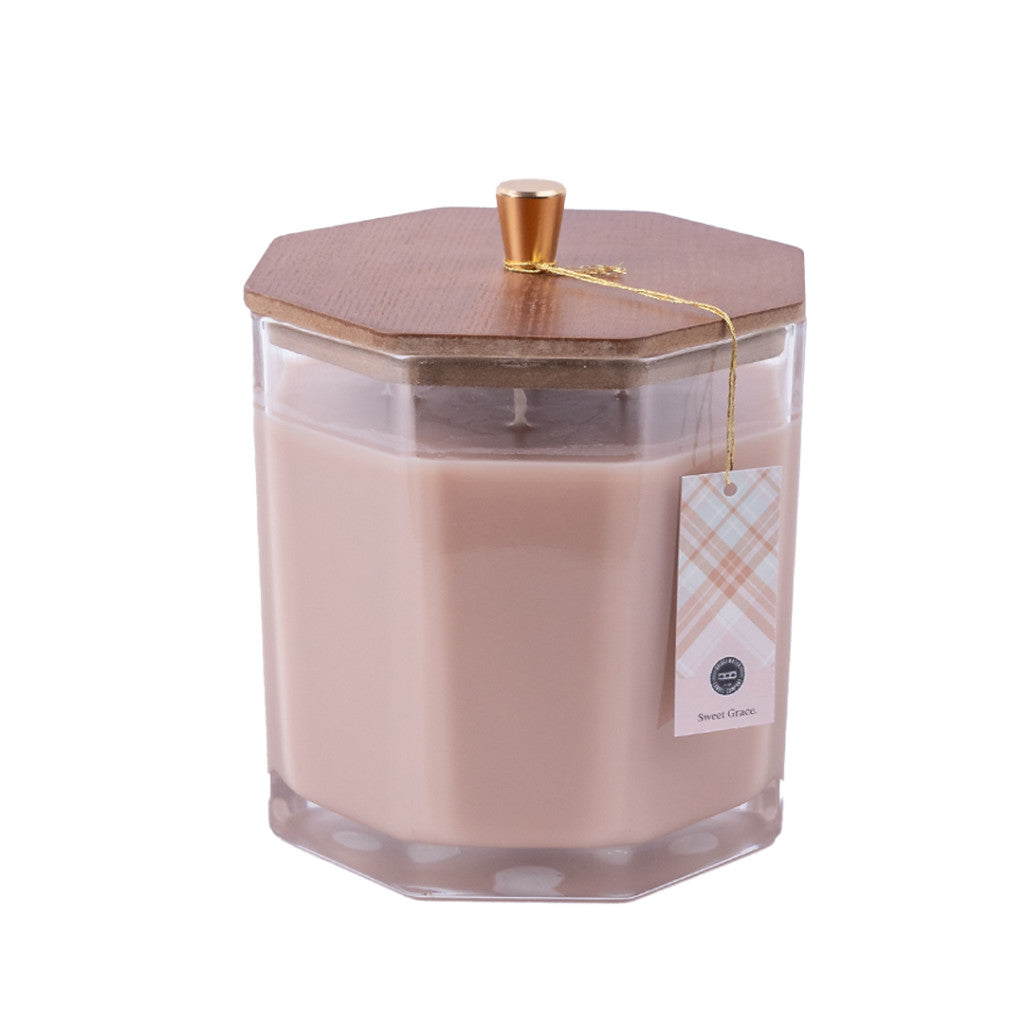 The Bridgewater Candle Company Sweet Grace Large Decorative Candle features a premium soy-blend in a faceted glass jar with a wooden hexagonal lid and gold knob, plaid tag, and the signature Sweet Grace fragrance.