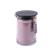 The Bridgewater Candle Company Hello Night 18oz Jar Candle features pink soy-blend wax in a clear glass jar with a black lid and hanging product tag, set against a white background.