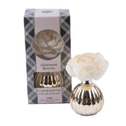 The Bridgewater Candle Company Afternoon Retreat Mercury Flower Diffuser includes an 8 fl oz (236 mL) metallic gold vase with a white flower top, adding elegant home fragrance next to its boxed packaging.