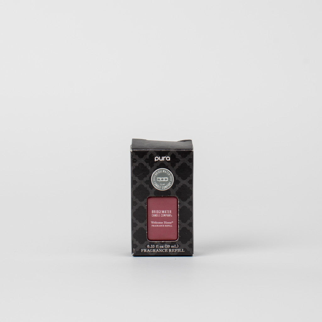 A black box of Bridgewater Candle Company Pura+Bridgewater Fragrance Refill - Welcome Home, with a patterned design and label, ideal for your smart home diffuser, set against a plain white background.