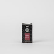 A black box of Bridgewater Candle Company Pura+Bridgewater Fragrance Refill - Welcome Home, with a patterned design and label, ideal for your smart home diffuser, set against a plain white background.