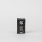 A black box of Pura + Bridgewater Fragrance Refill - Afternoon Retreat by Bridgewater Candle Company sits centered on a white background. The packaging shows a subtle pattern, brand name, and fragrance title.
