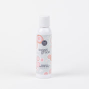 A white bottle of Bridgewater Candle Company’s Sweet Grace Wrinkle Release Spray with a gray and pink circular design stands upright against a white background, ideal for refreshing and smoothing fabrics.