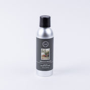 A non-aerosol room spray from Bridgewater Candle Company, named Afternoon Retreat, with a black label and cap featuring tree imagery—an eco-friendly home fragrance shown against a plain white background.