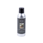 A 7 oz Afternoon Retreat Non-Aerosol Room Spray by Bridgewater Candle Company, in a silver can with black cap and label featuring trees and premium home fragrance, is shown on a white background.