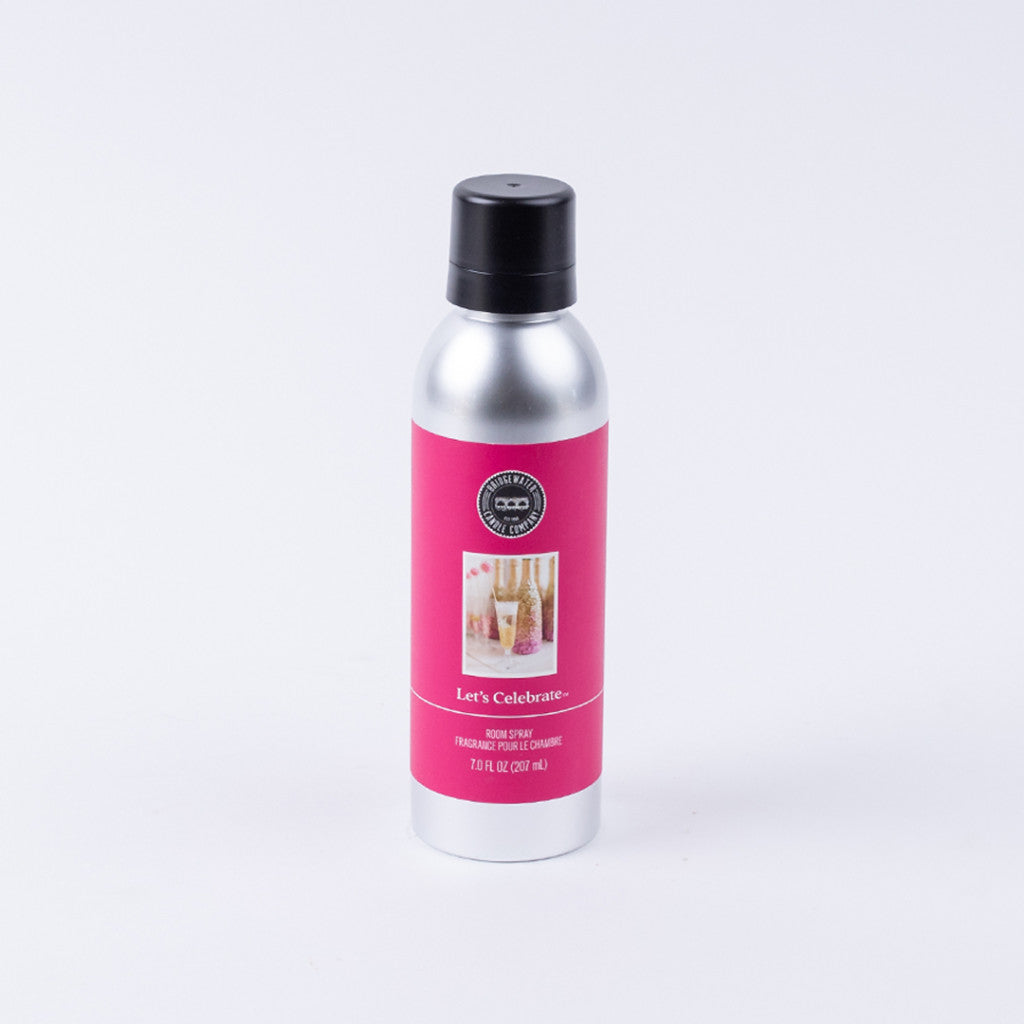 Bridgewater Candle Company’s Lets Celebrate Non-Aerosol Room Spray comes in a silver bottle with a black cap and pink label with champagne glasses. This 7 fl oz eco-friendly spray adds festive fragrance to any celebration.
