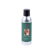 A silver can of Bridgewater Candle Company’s Christmas Bliss Non-Aerosol Room Spray with a green holiday-themed label and black cap; contains 7 oz (207 ml) of eco-friendly fragrance, shown against a white background.