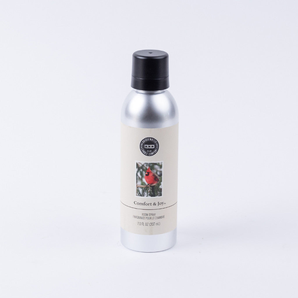 A silver can with a black cap and cream label featuring a red bird reads Comfort & Joy Non-Aerosol Room Spray, 7 oz (207 mL) by Bridgewater Candle Company—an inviting, eco-friendly home fragrance option.