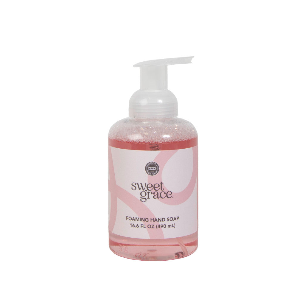 The Bridgewater Candle Company Sweet Grace Foaming Hand Soap features a clear plastic bottle with a pump, pink liquid, an oriental fragrance, and moisturizing aloe. This 16.6 fl oz (490 mL) soap offers a luxurious hand-washing experience.