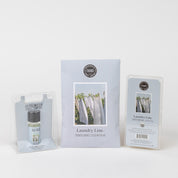 The Bridgewater Candle Company Laundry Line Flameless Bundle is displayed against a white background, with each item in light blue packaging featuring an image of laundry drying on a clothesline.