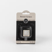 A packaged Bridgewater Candle Company Sweet Grace Auto Vent Clip car air freshener is shown against a white background, with sleek black packaging, white text, and a small window highlighting the stylish fragrance product inside.