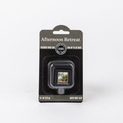 The Bridgewater Candle Company Afternoon Retreat Auto Vent Clip air freshener, in black packaging with white text and a scenic image, features a trees motif and keeps your car fresh for up to 30 days.