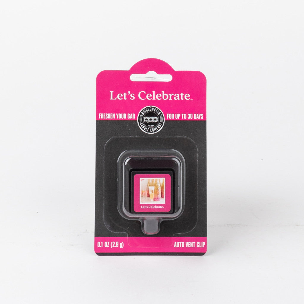 The Bridgewater Candle Company Lets Celebrate Auto Vent Clip features pink and black packaging, lasts up to 30 days, and freshens your car with a floral scent. The package includes an image of two glasses.