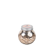 The Sweet Grace Collection Candle #008 by Bridgewater Candle Company features a round, metallic gold jar with a silver screw-top lid and textured patterns, filled with soy-blend wax, shown against a plain white background.
