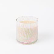 The Sweet Grace Collection Candle #058 by Bridgewater Candle Company features a pastel speckled glass jar with two wicks and light cream soy-blend wax, displayed on a plain white background.