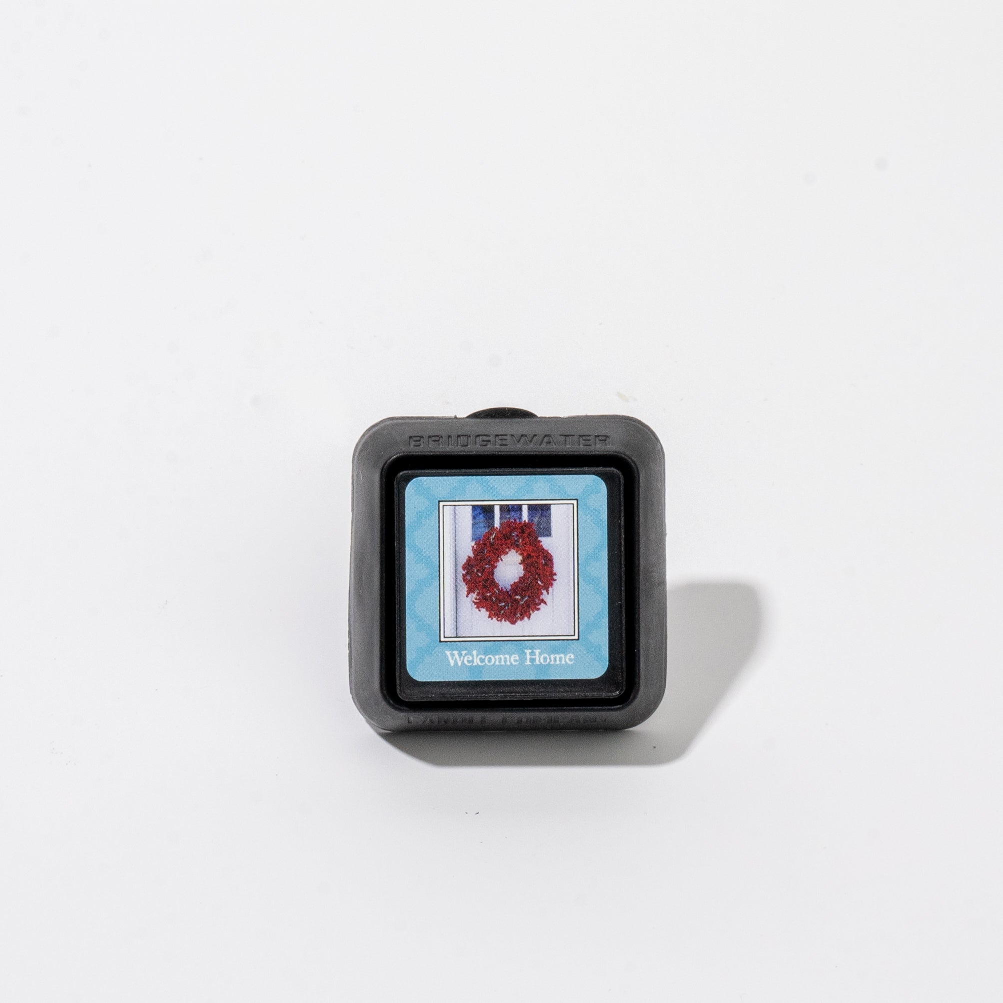 Square Auto Vent Clip-Welcome Home featuring a red wreath on a blue door with the text Welcome Home at the bottom.