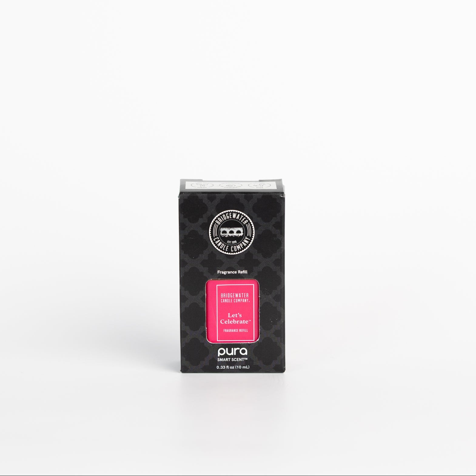A black rectangular box of Bridgewater Candle Pura + Bridgewater Fragrance Refill in the scent "Let's Celebrate" stands upright on a white background. The front label is pink with white text—ideal for elevating your home fragrance.