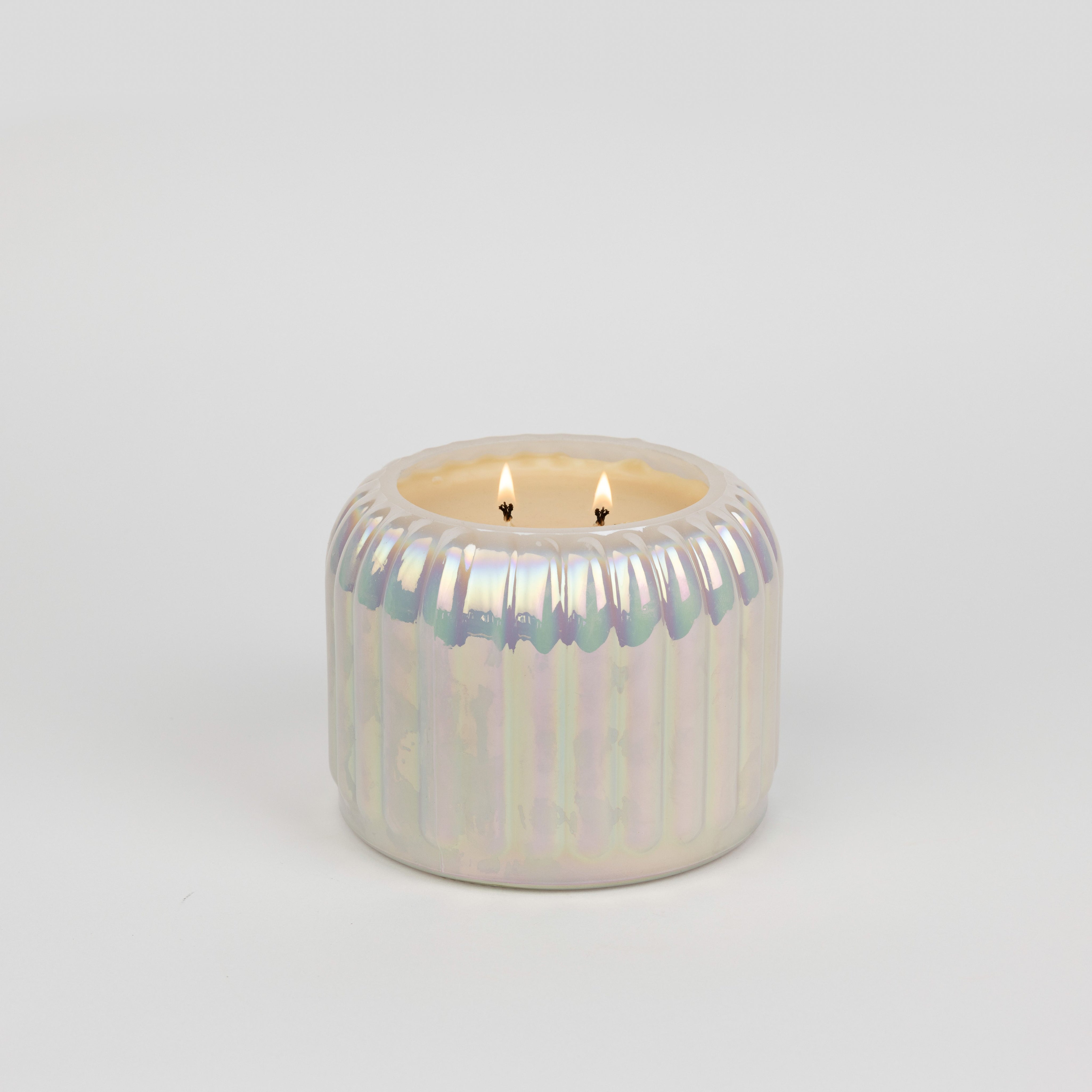 The Bridgewater Candle Sweet Grace Collection Candle #071—a cream-colored, soy-blend candle with two wicks—sits in a round, pearlescent holder with vertical grooves, displayed against a plain white background.