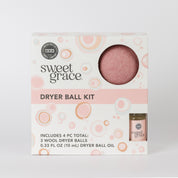 The Bridgewater Candle Sweet Grace Dryer Ball Kit features a box with a circular window, revealing pink wool dryer balls. It includes 3 dryer balls, a 0.33 fl oz (10 mL) fragrance oil, and packaging with pink and orange circles.