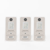 Sweet Grace Wax Bar 3 Pack Bundle, featuring soy-blend wax for flameless fragrance, are displayed against a white background with angel wings and product details on each label.