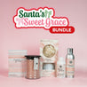 Santa's Sweet Grace Bundle by Fast Bundle features a striped candle box, large jar candle, flower diffuser box, refill bottle, and room spray—perfect for holiday gifting—all set against a pink background with a festive logo above.